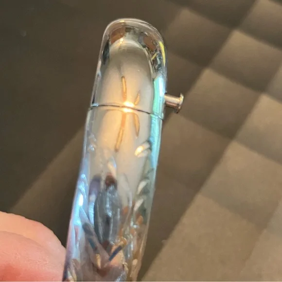 Classic Sterling Silver Polished Bangle Bracelet with Floral Design